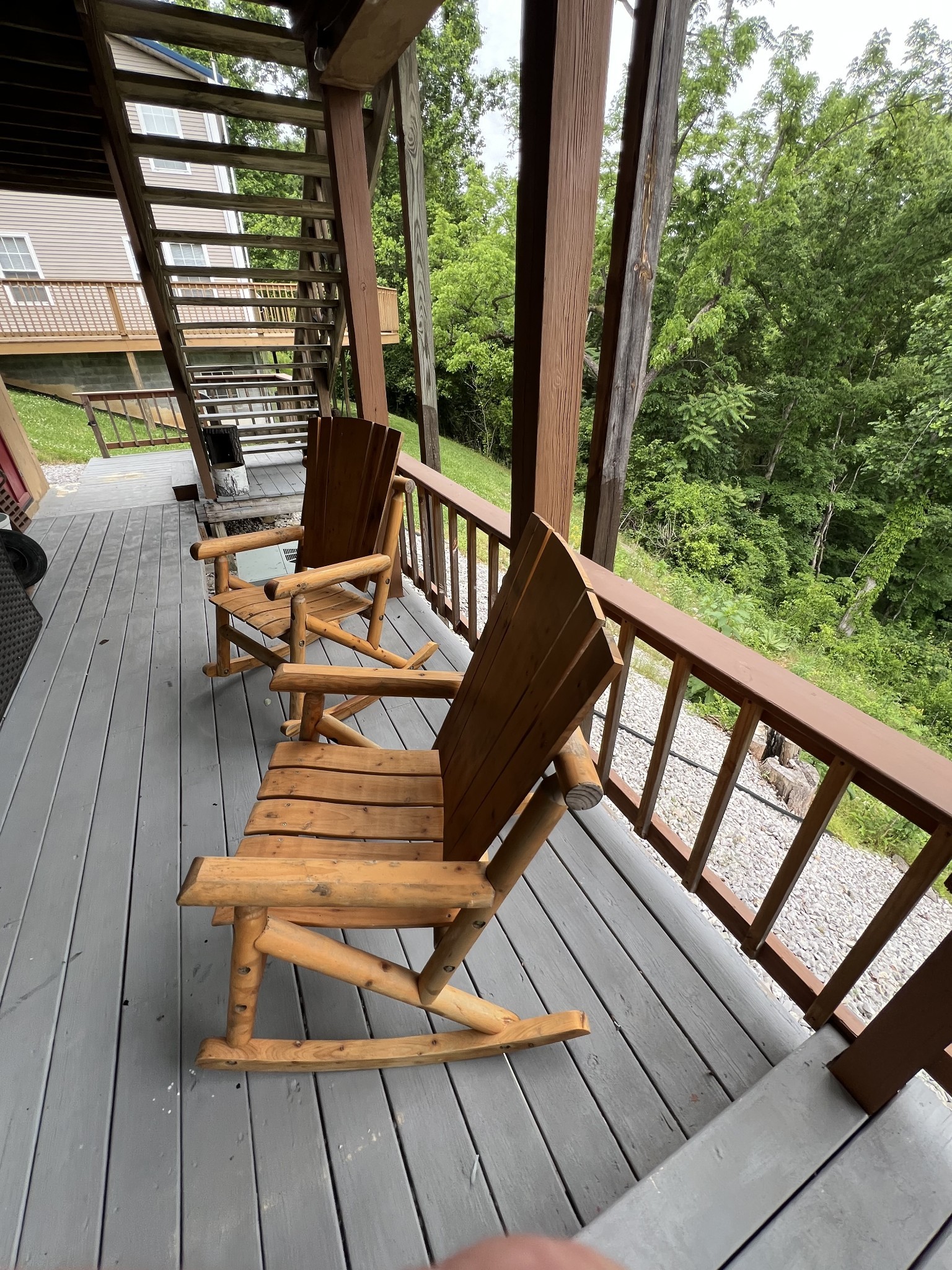 225 Bill Hunter Road Celina, TN 38551 - Photo 16 of 57 a view of a chairs and tables on the roof deck