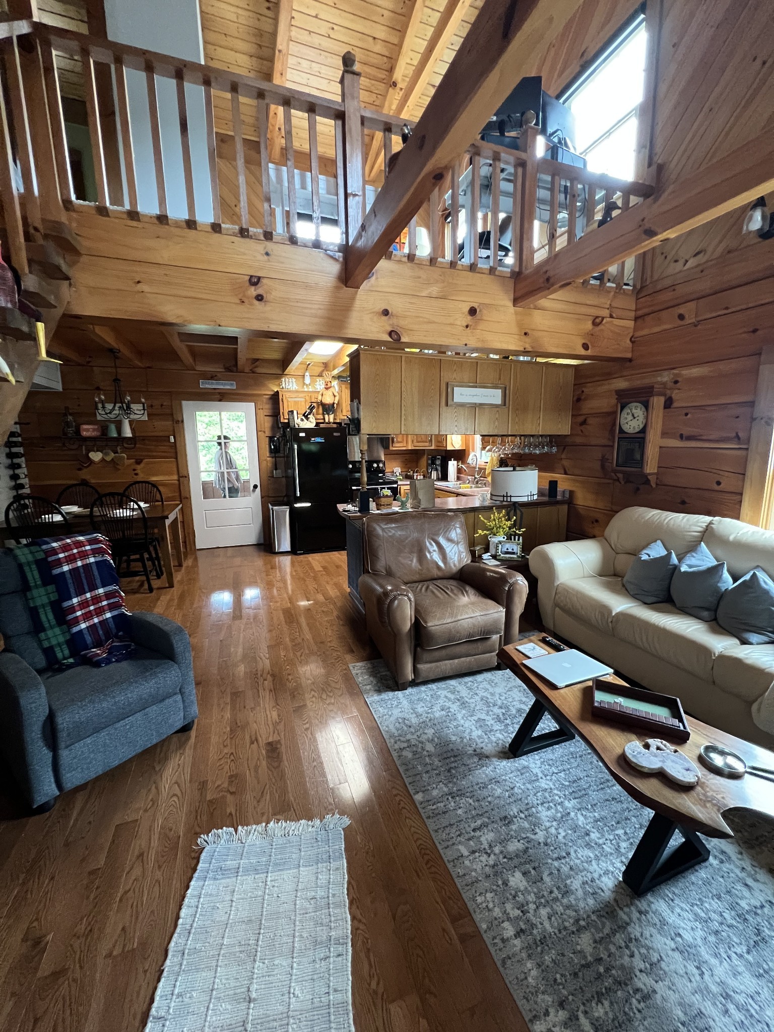 225 Bill Hunter Road Celina, TN 38551 - Photo 19 of 57 a living room with lots of furniture and a chandelier