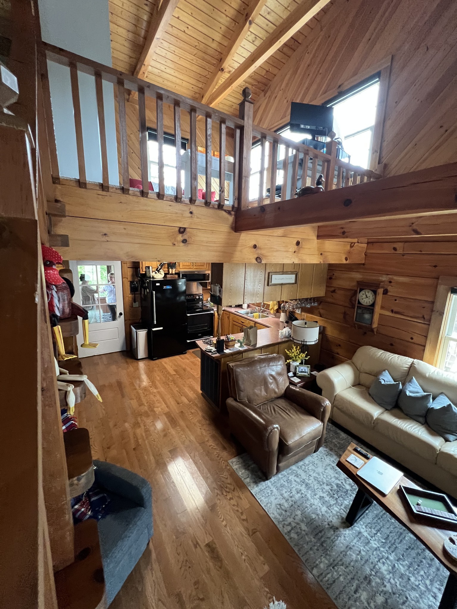 225 Bill Hunter Road Celina, TN 38551 - Photo 23 of 57 a living room with furniture and a flat screen tv