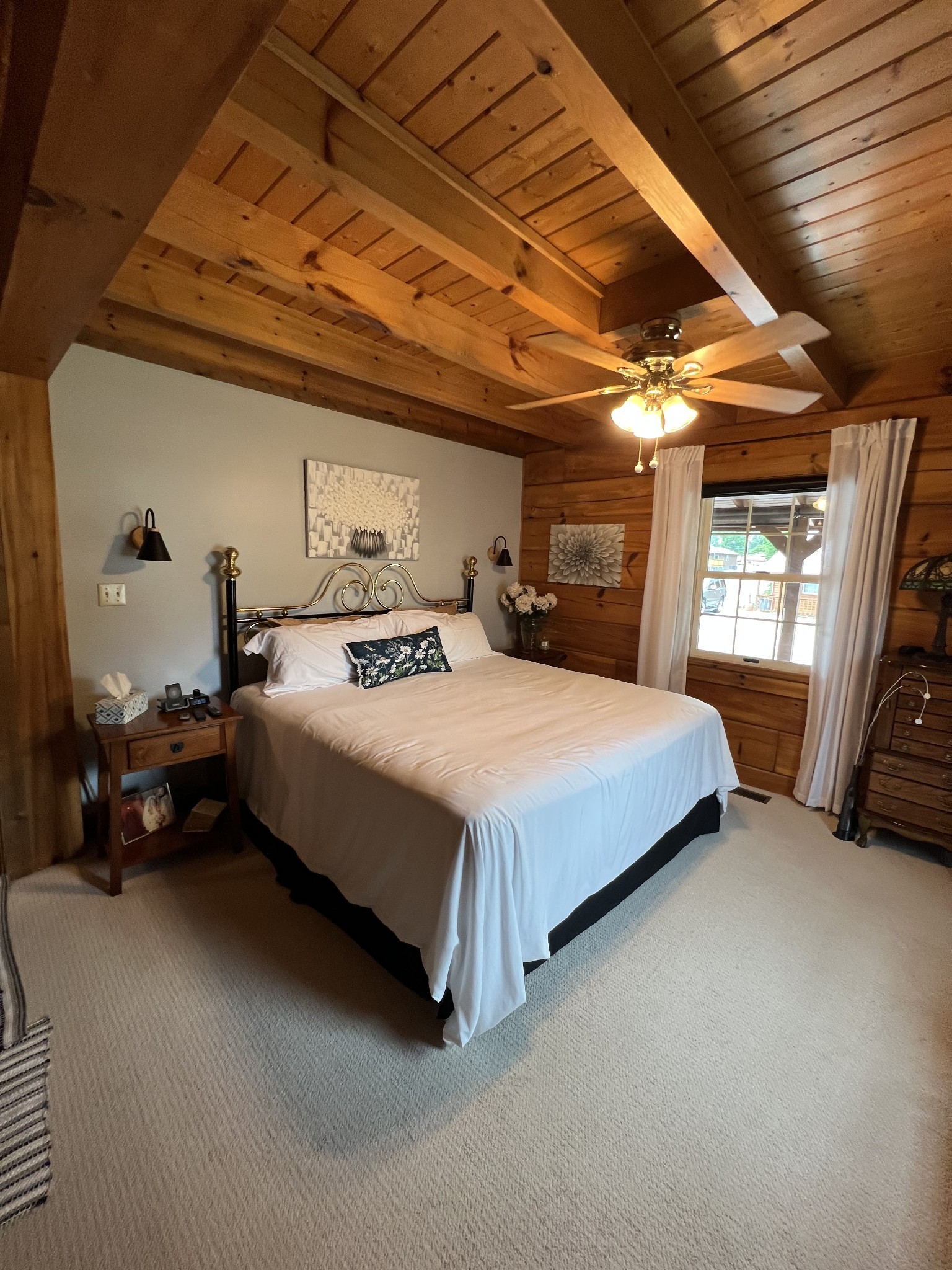 225 Bill Hunter Road Celina, TN 38551 - Photo 43 of 57 a spacious bedroom with a bed and a large mirror