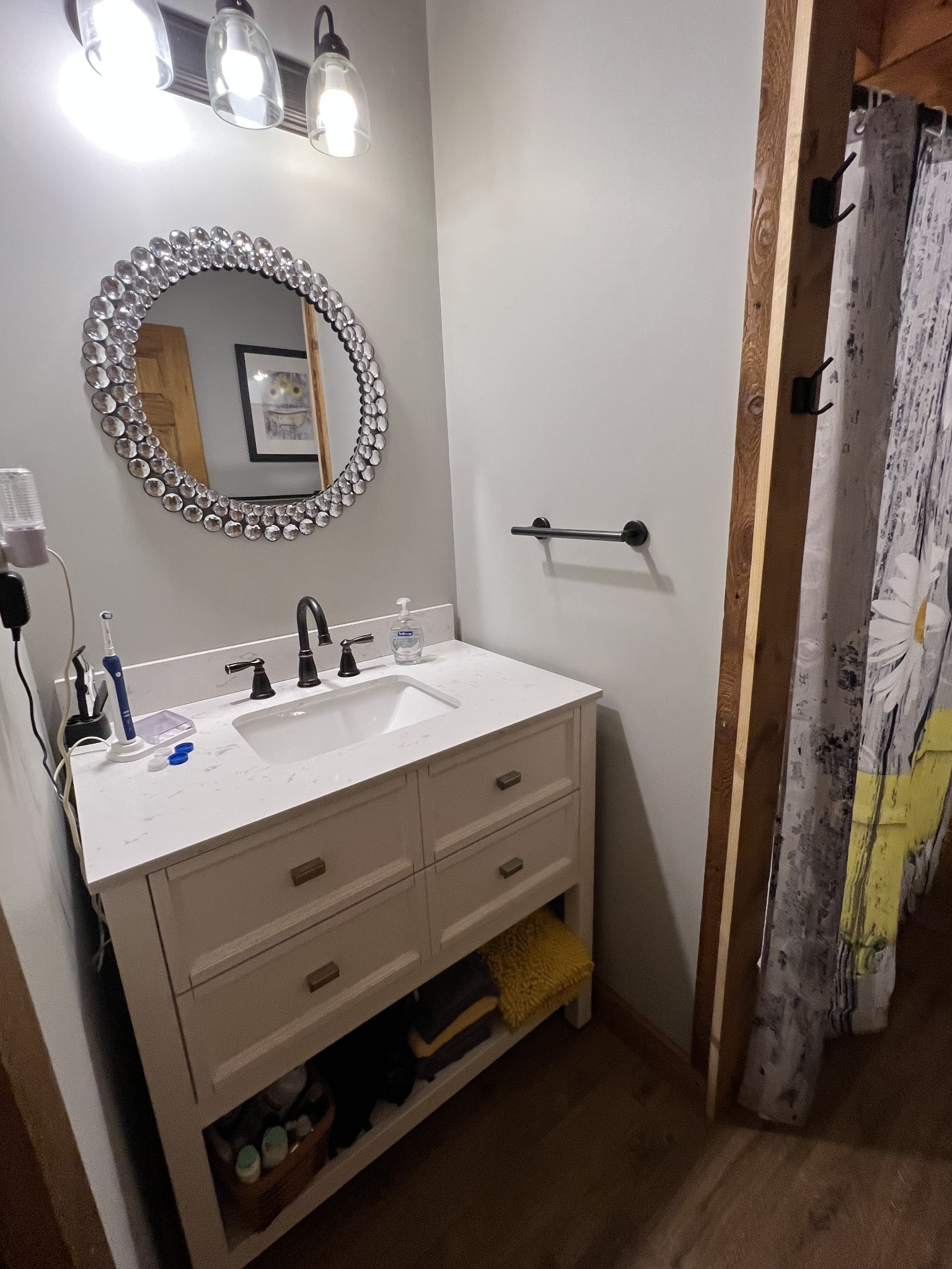 225 Bill Hunter Road Celina, TN 38551 - Photo 45 of 57 a bathroom with a sink and a mirror
