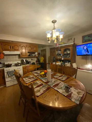 a view of a dining room with furniture