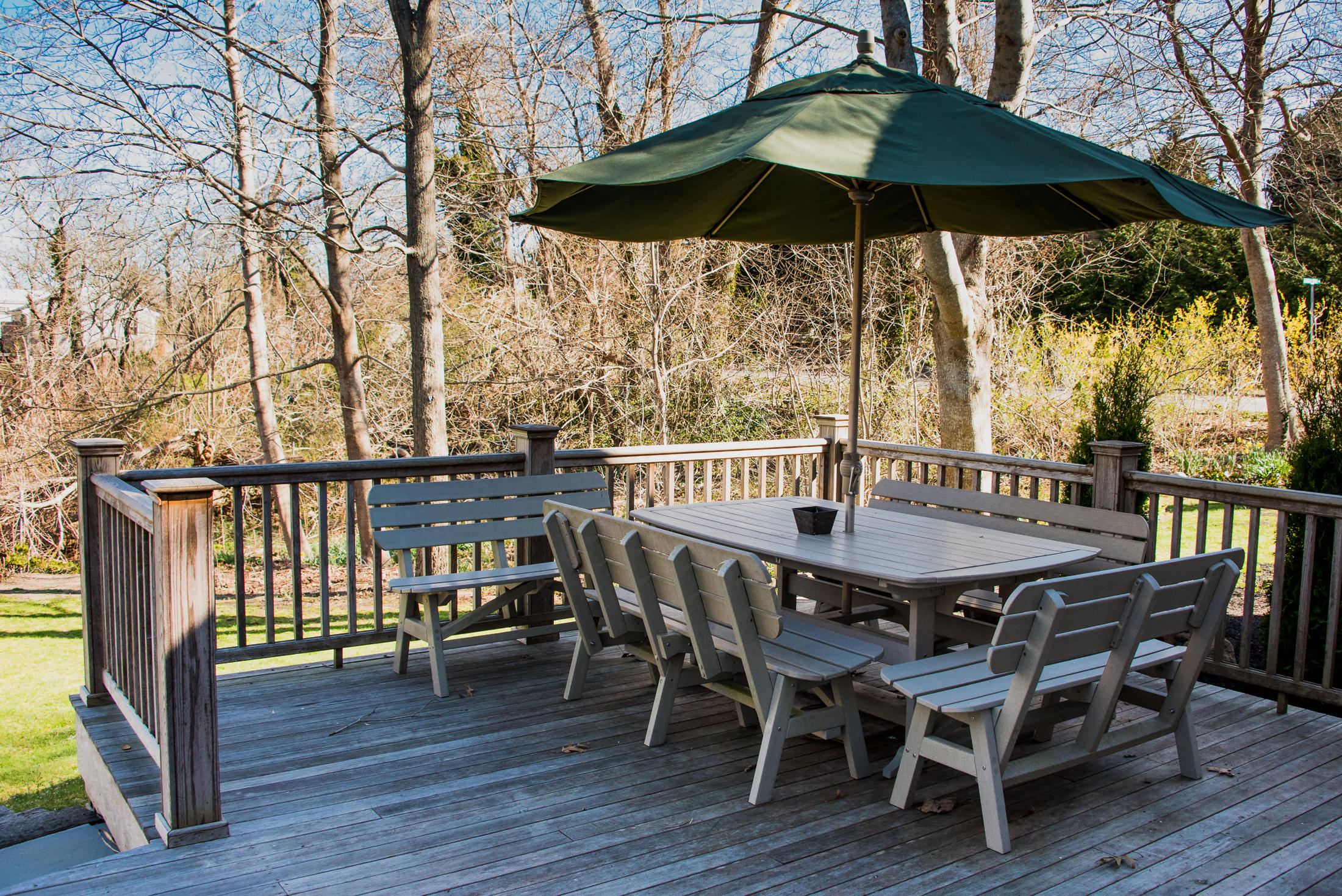 20 Salt Pond Road Eastham, MA 02642 - Photo 8 of 34 a patio with wooden floor table and chairs