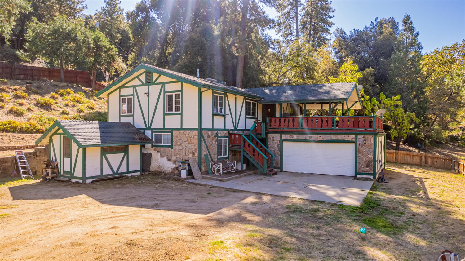 42585 Buckeye Road Oakhurst, CA 93644 - Photo 51 of 55 a view of a house with a yard