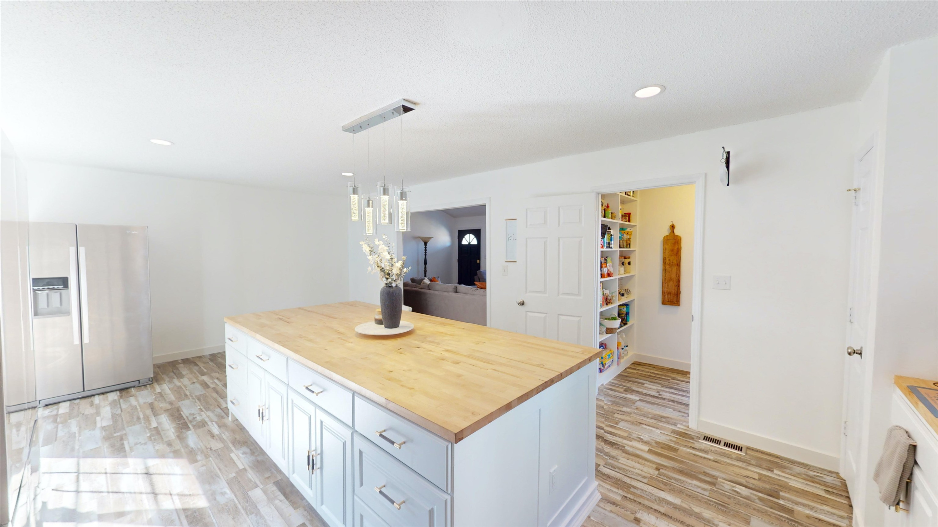 1036 Drew Drive Garner, NC 27529 - Photo 16 of 59 a spacious bathroom with a granite countertop sink and a mirror