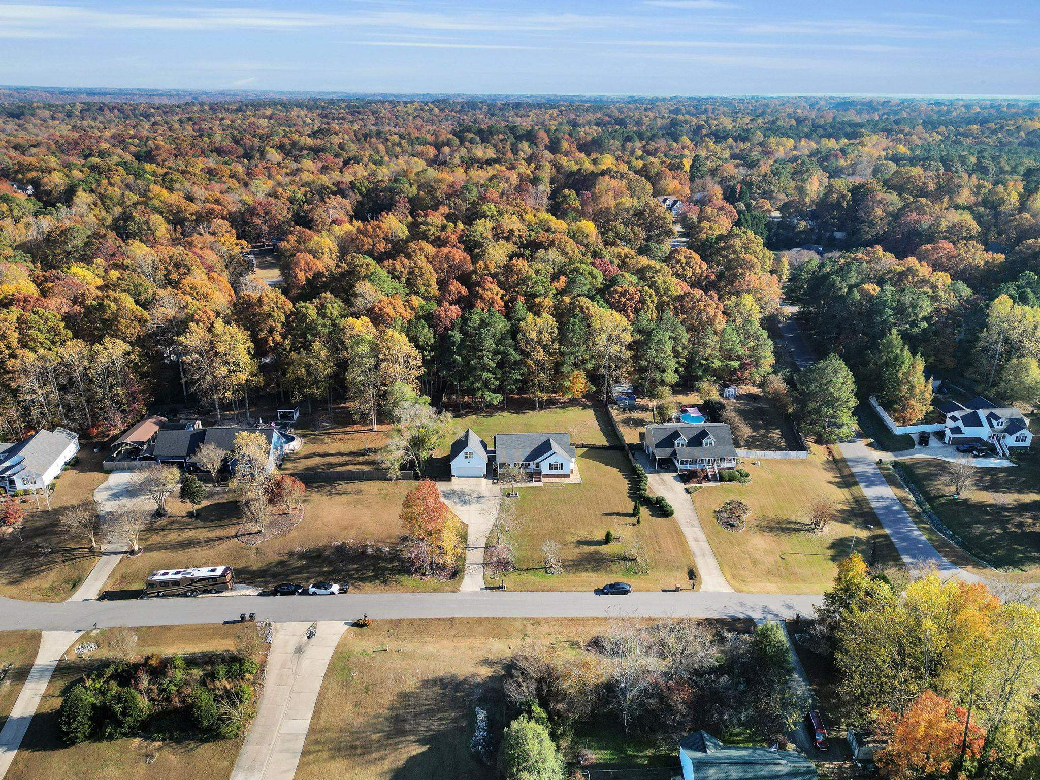 1036 Drew Drive Garner, NC 27529 - Photo 2 of 59 an aerial view of residential houses with outdoor space
