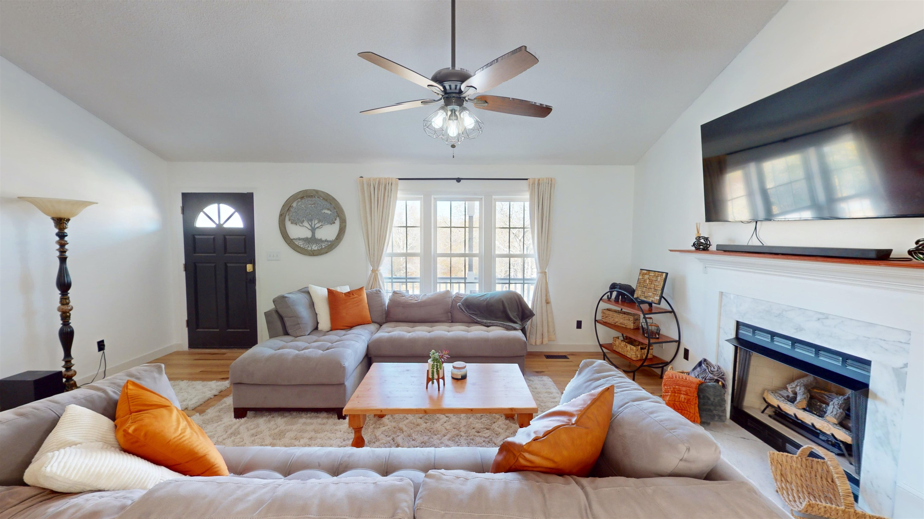 1036 Drew Drive Garner, NC 27529 - Photo 24 of 59 a living room with furniture and a fireplace