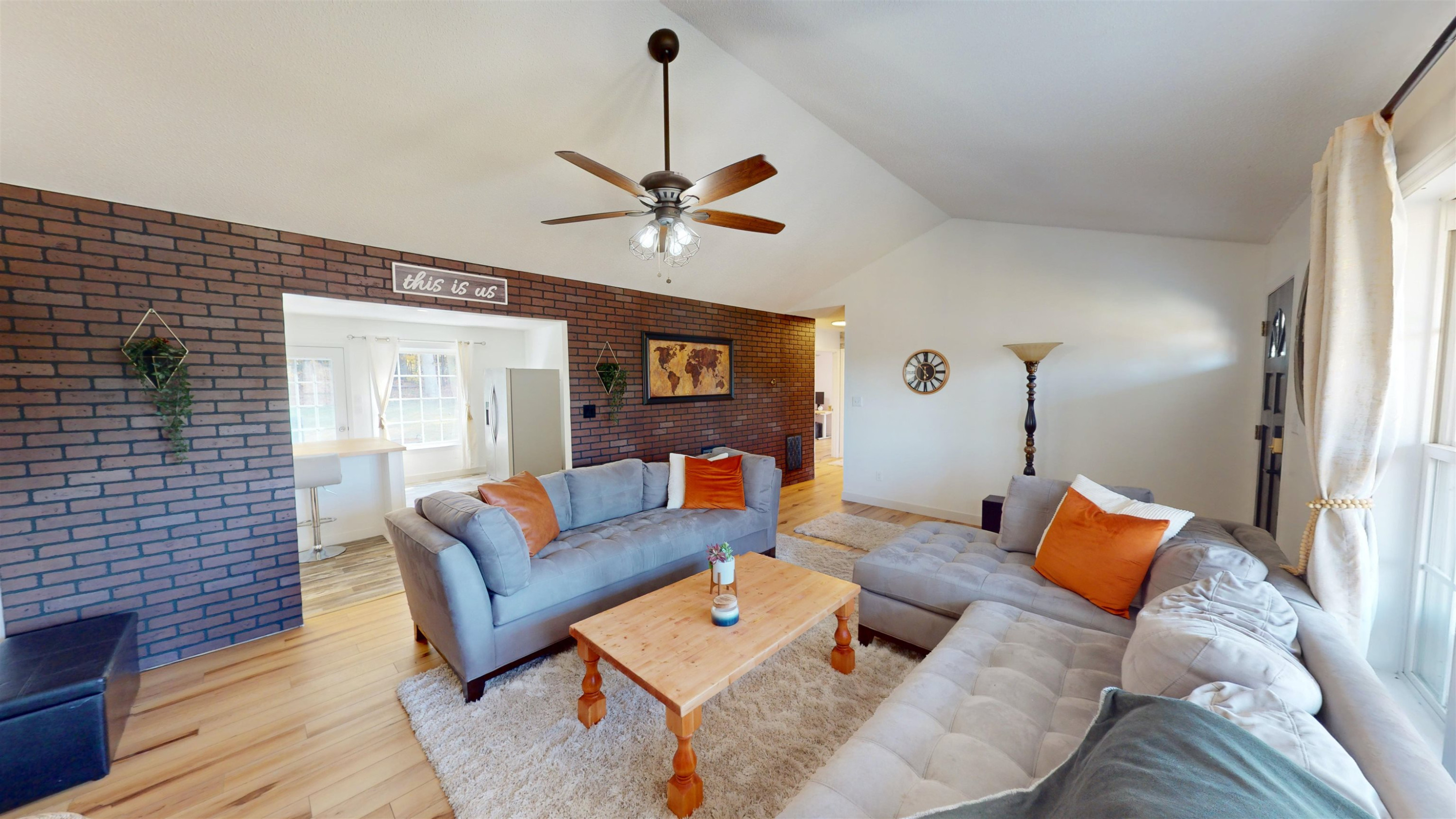 1036 Drew Drive Garner, NC 27529 - Photo 26 of 59 a living room with furniture and wooden floor