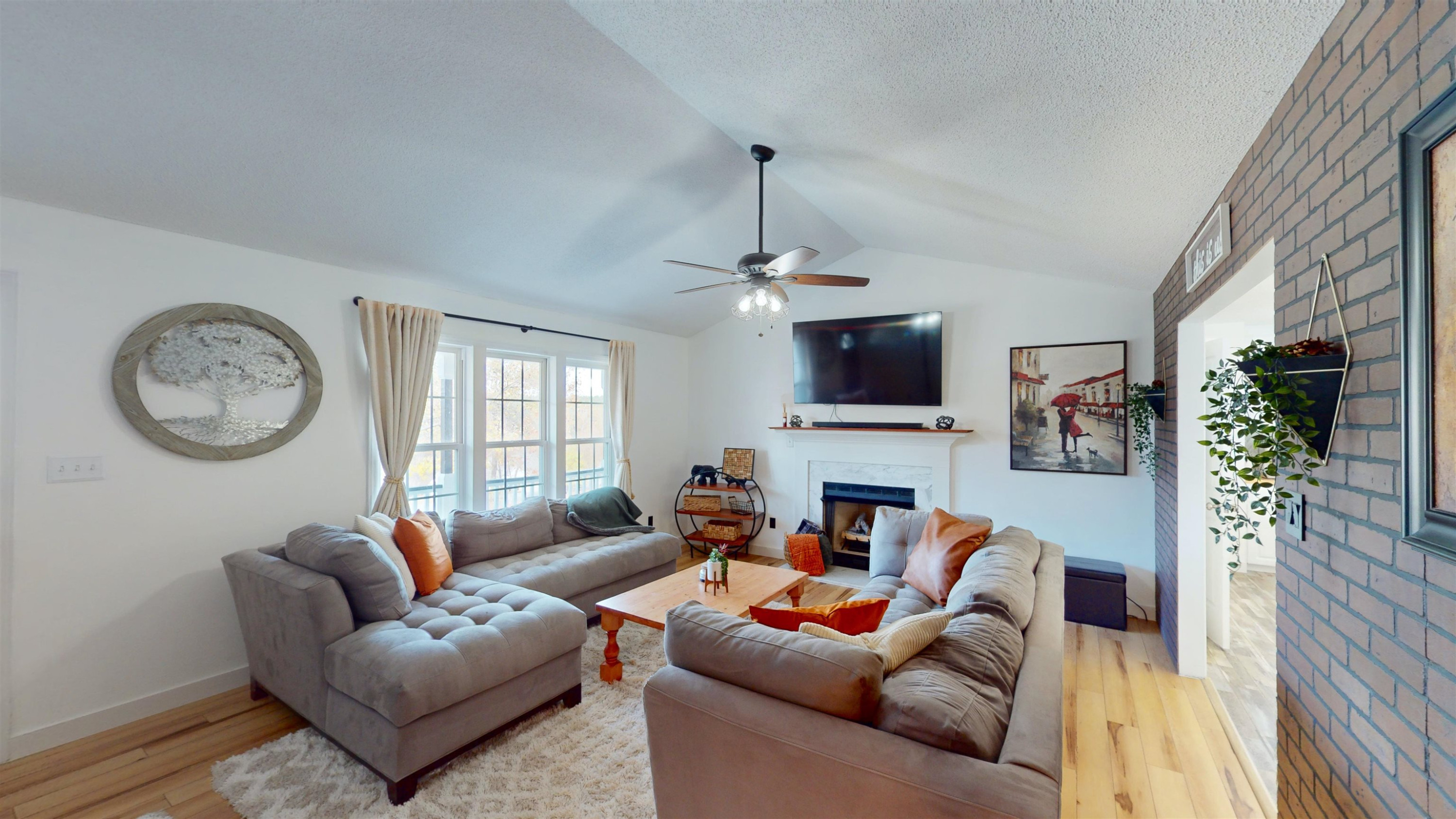 1036 Drew Drive Garner, NC 27529 - Photo 30 of 59 a living room with furniture a clock and a window