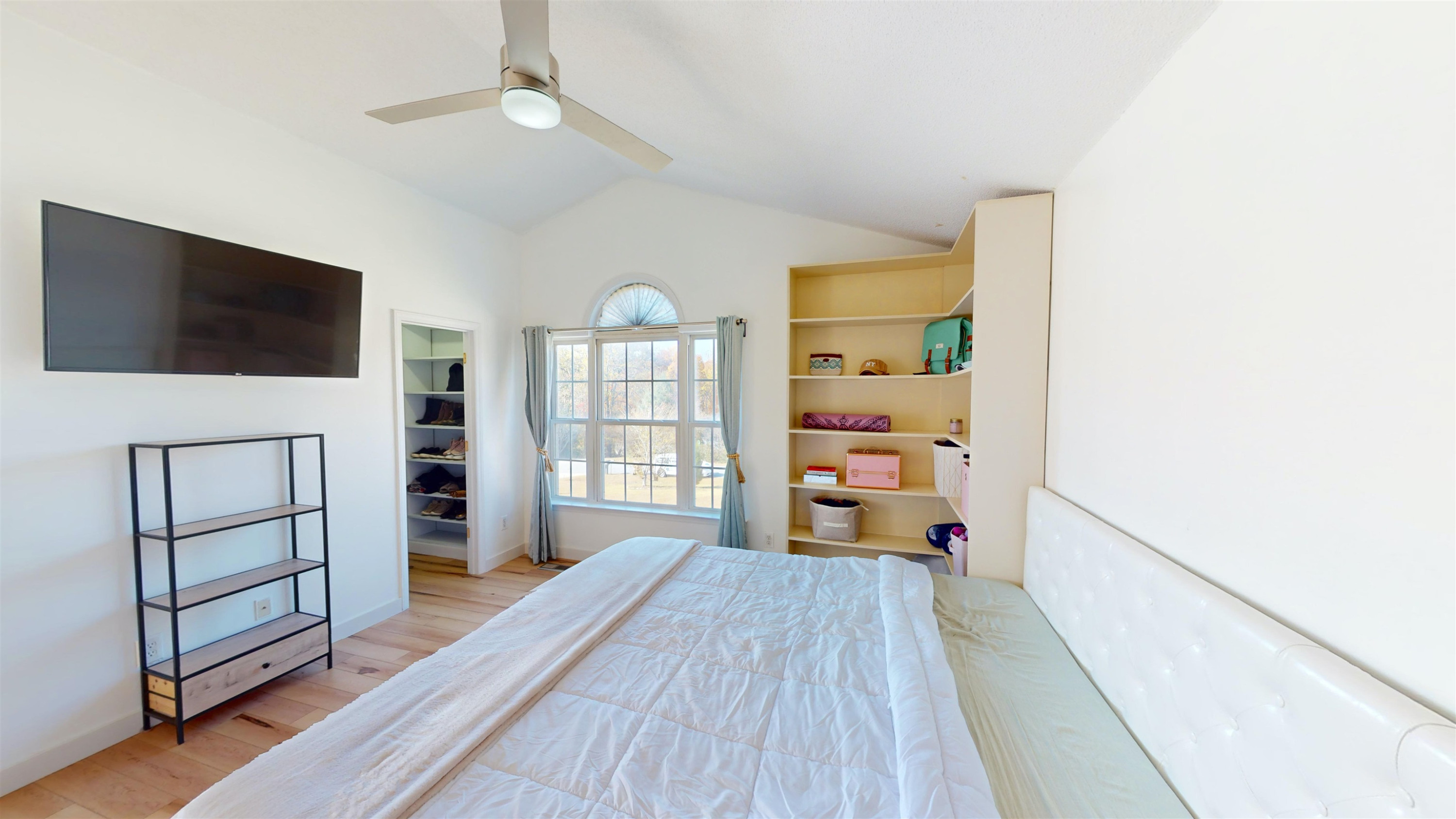 1036 Drew Drive Garner, NC 27529 - Photo 39 of 59 a living room with furniture and a flat screen tv