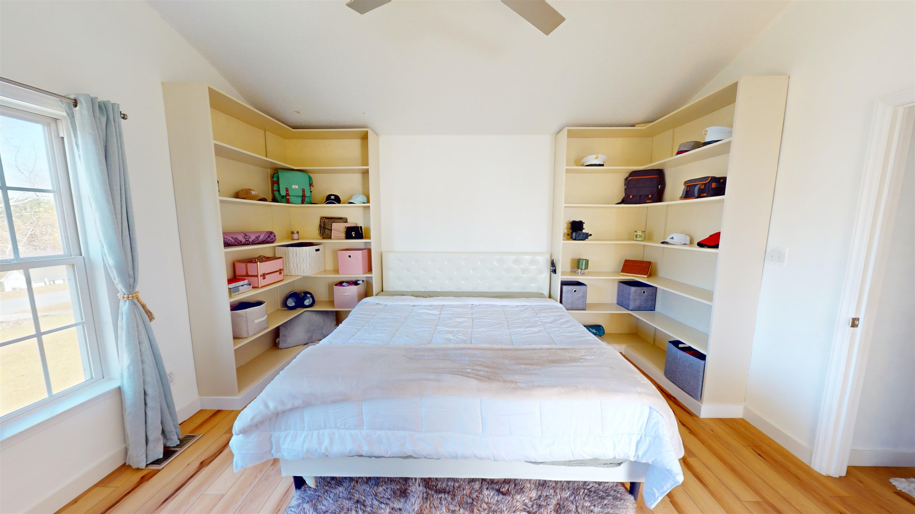 1036 Drew Drive Garner, NC 27529 - Photo 41 of 59 a room with toys and dresser with wooden floor