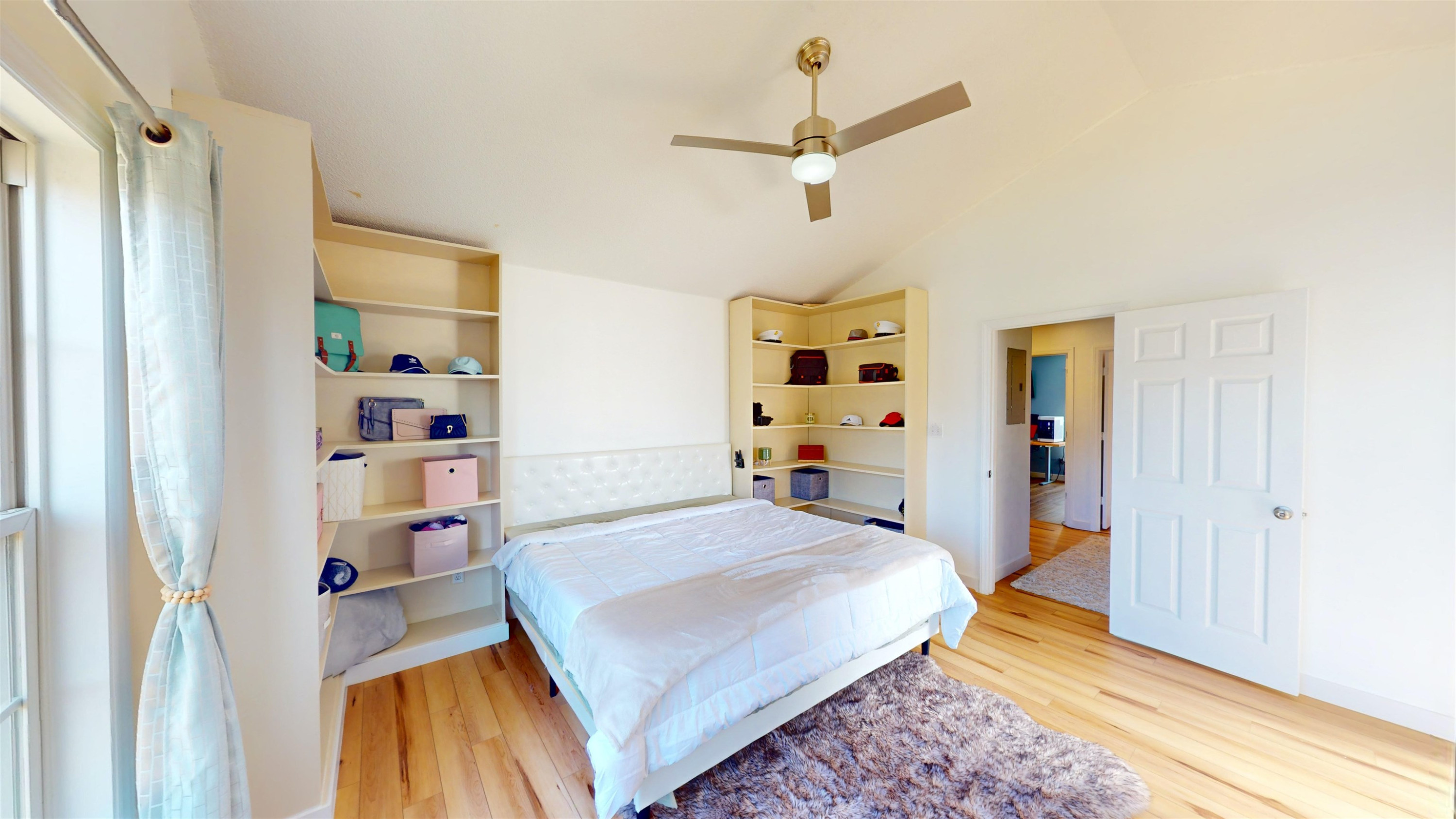 1036 Drew Drive Garner, NC 27529 - Photo 42 of 59 a bedroom with a bed and a book shelf