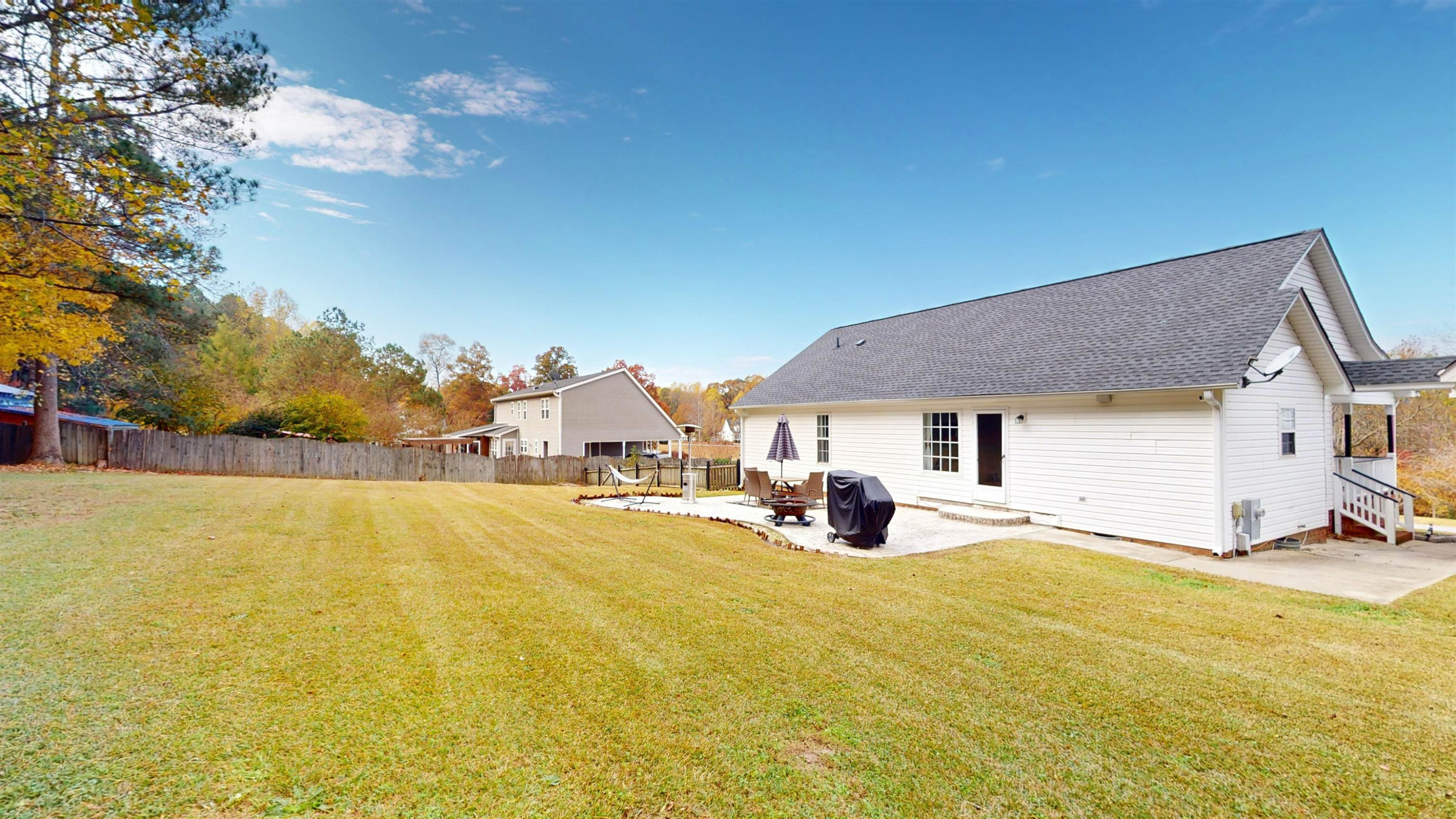 1036 Drew Drive Garner, NC 27529 - Photo 48 of 59 a view of a house with pool and sitting area