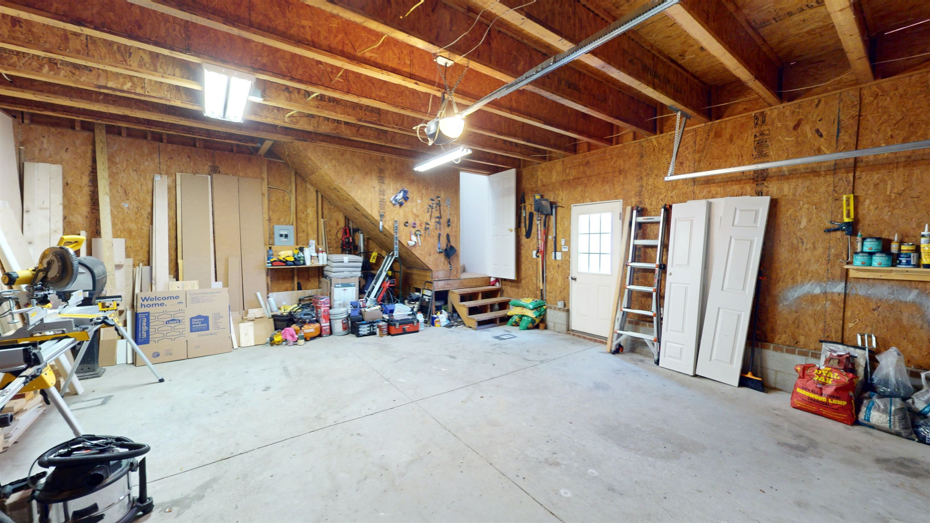 1036 Drew Drive Garner, NC 27529 - Photo 58 of 59 a view of a room with gym equipment