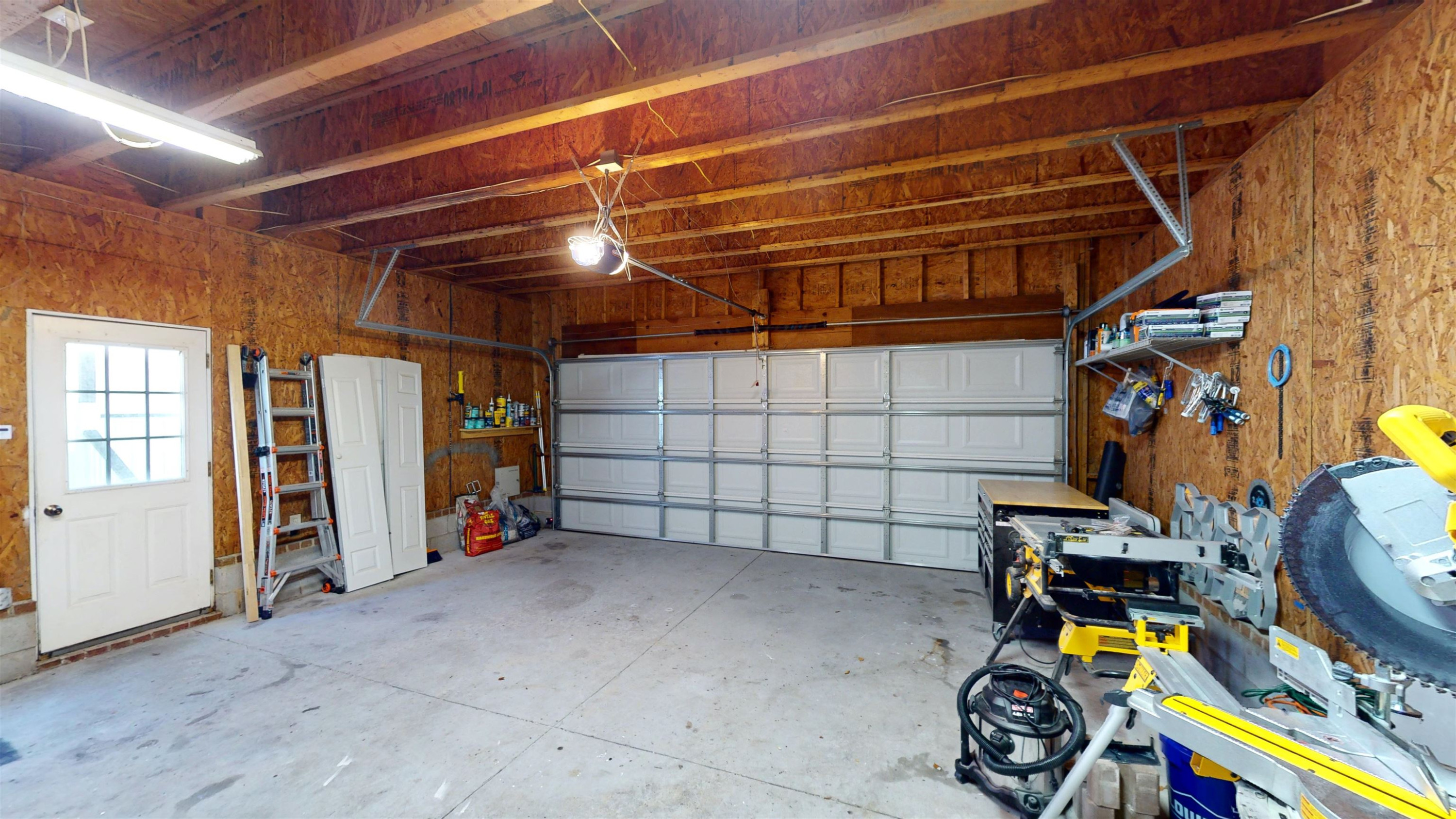 1036 Drew Drive Garner, NC 27529 - Photo 59 of 59 a view of a room with gym equipment