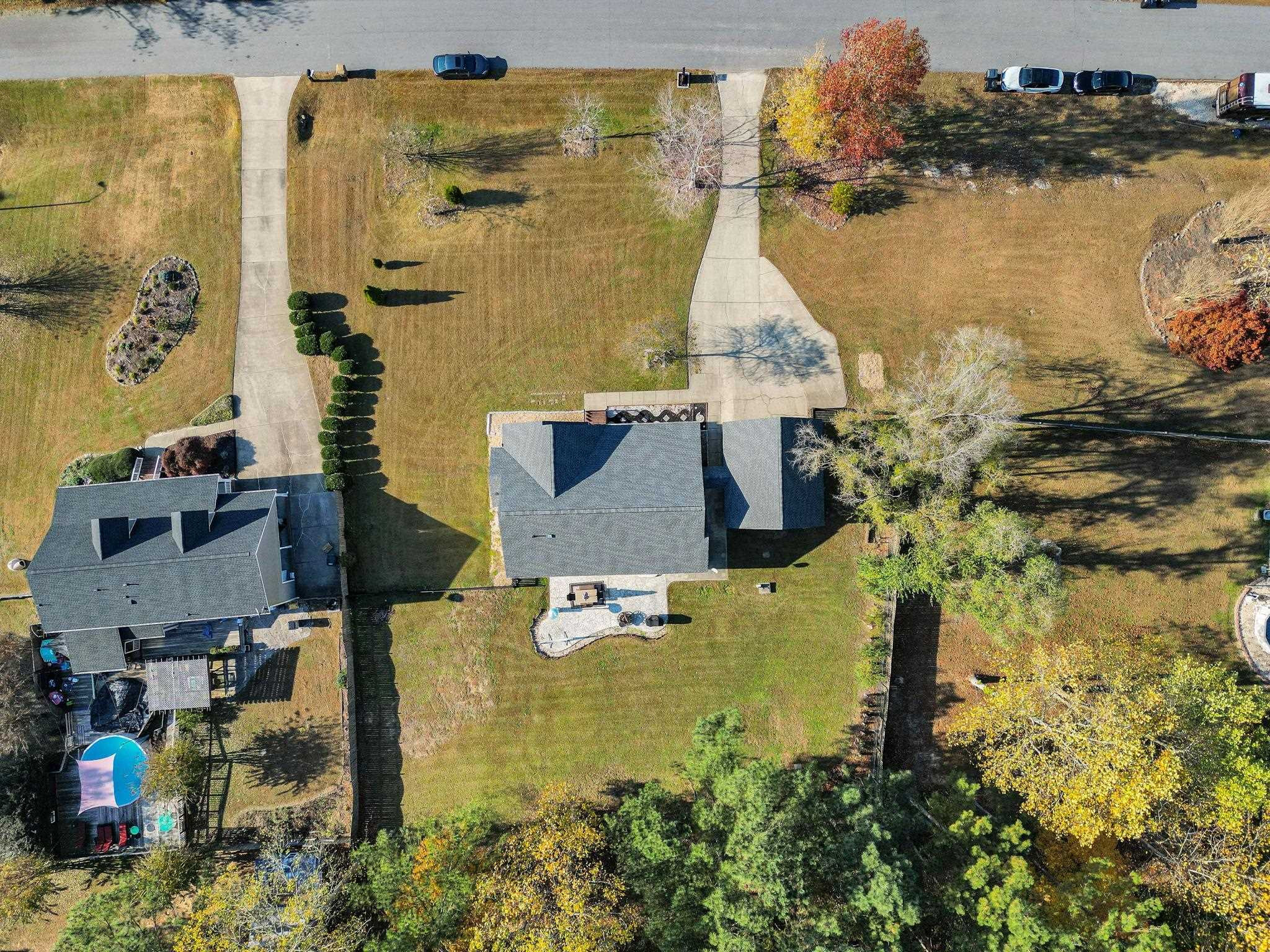 1036 Drew Drive Garner, NC 27529 - Photo 7 of 59 an aerial view of residential houses with outdoor space