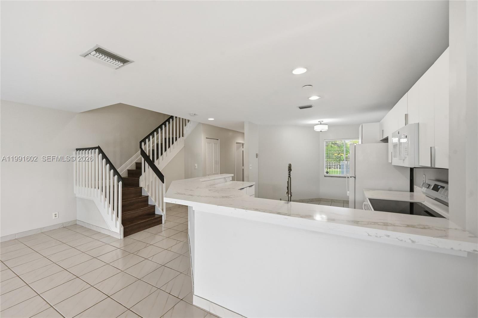 6215 Old Court Road, Unit 505 Boca Raton, FL 33433 - Photo 7 of 36 a bathroom with a sink and a mirror