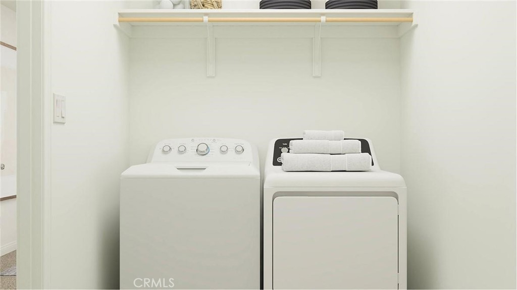 1674 Phantom Lane Rialto, CA 92376 - Photo 15 of 18 a utility room with dryer and washer