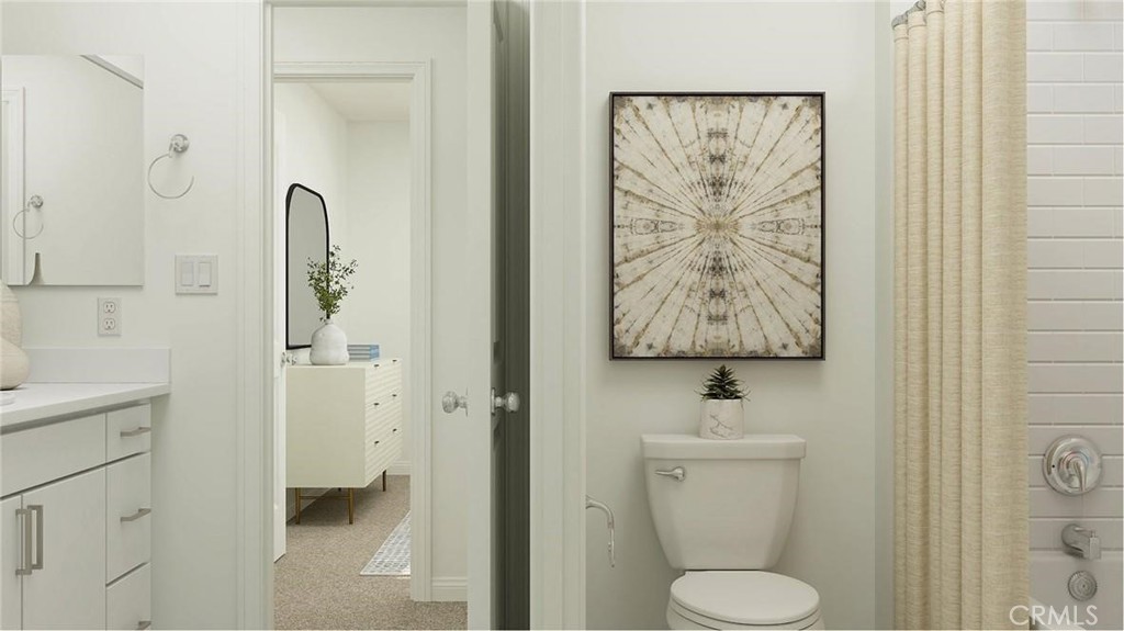 1674 Phantom Lane Rialto, CA 92376 - Photo 8 of 18 a bathroom with a toilet sink and shower