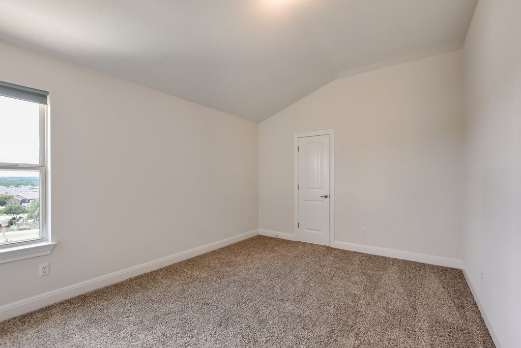 2521 Blended Tree Ranch Drive Leander, TX 78641 - Photo 31 of 40 an empty room with a window