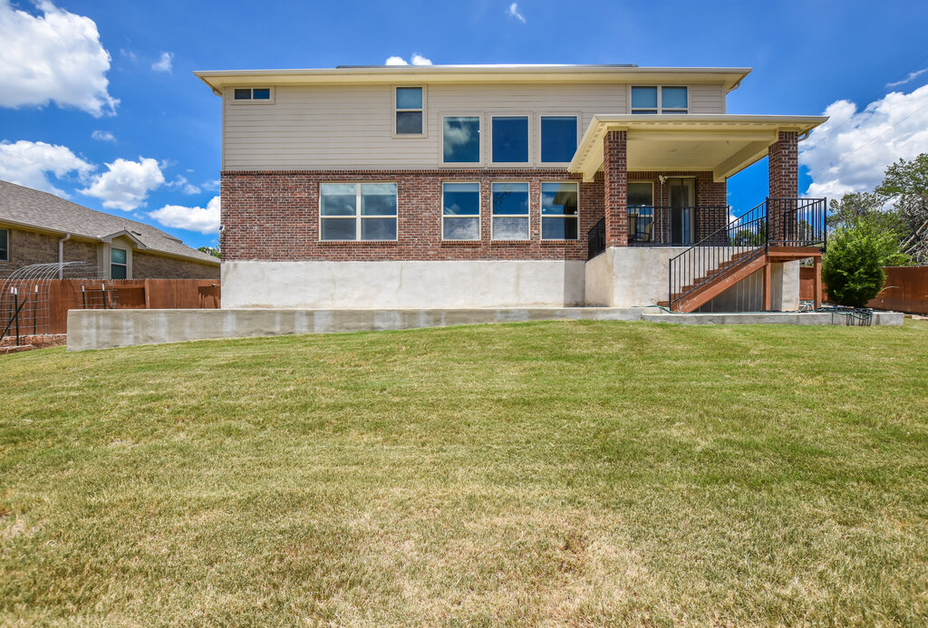 2521 Blended Tree Ranch Drive Leander, TX 78641 - Photo 40 of 40 a view of a house with a yard