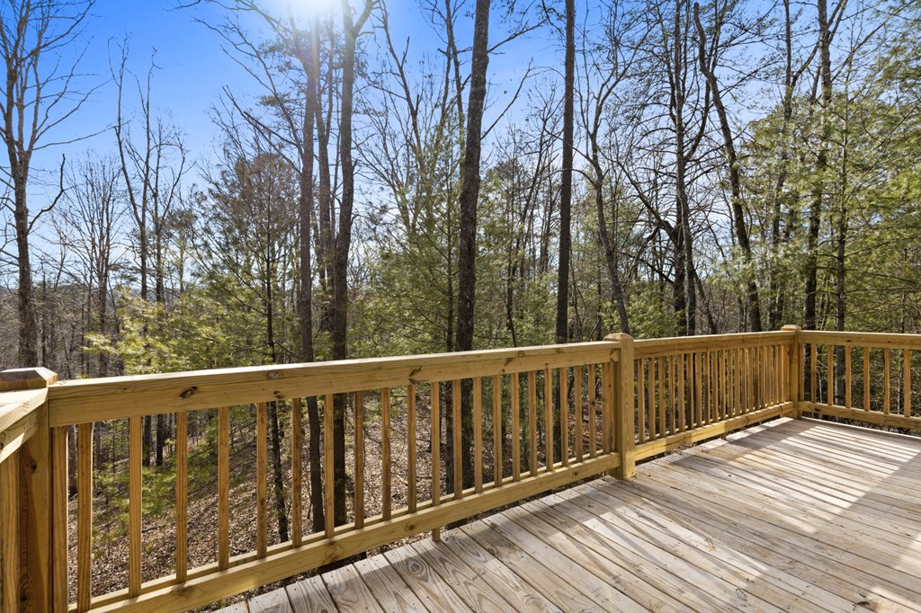 150 Williams Branch Drive Morganton, GA 30560 - Photo 25 of 28 a balcony with wooden floor and fence