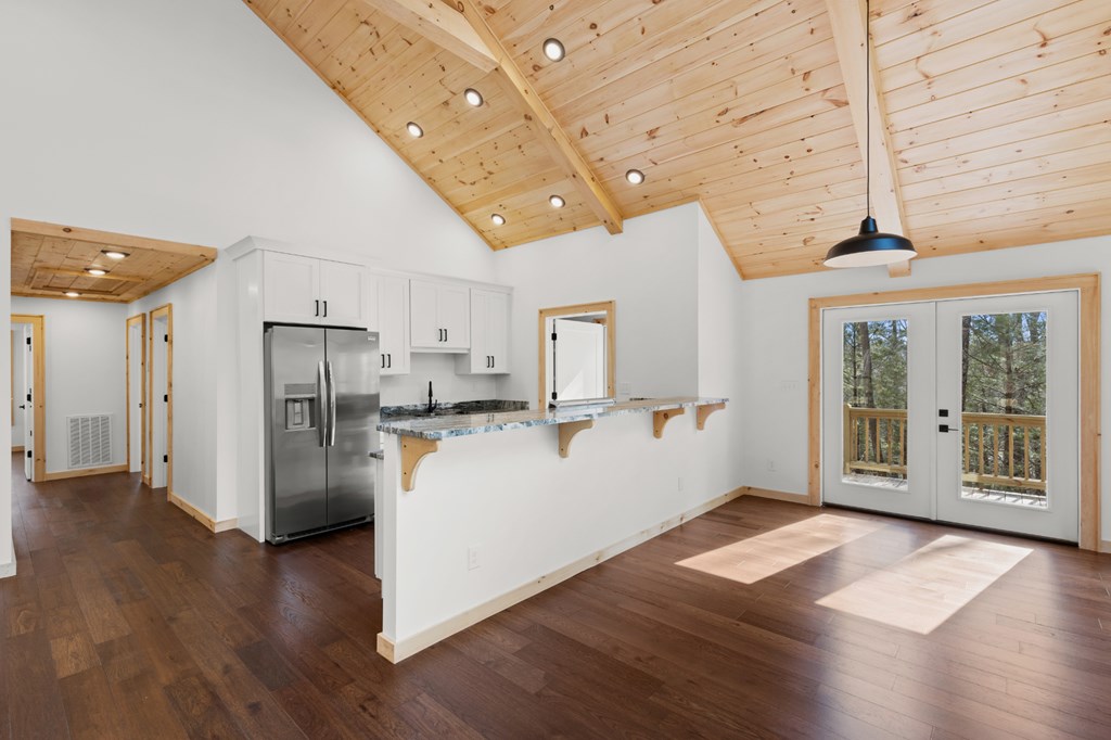 150 Williams Branch Drive Morganton, GA 30560 - Photo 9 of 28 a view of a kitchen with refrigerator and wooden floor