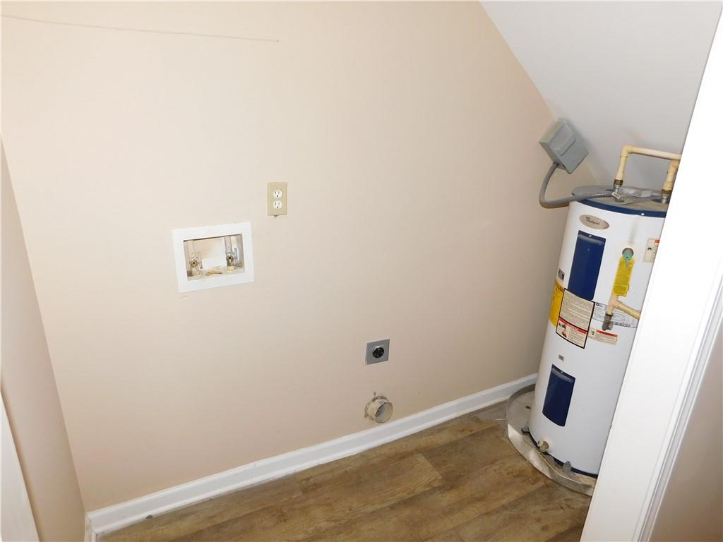1005 Linam Avenue Southeast Atlanta, GA 30315 - Photo 17 of 29 a view of a room with wooden floor and white wall