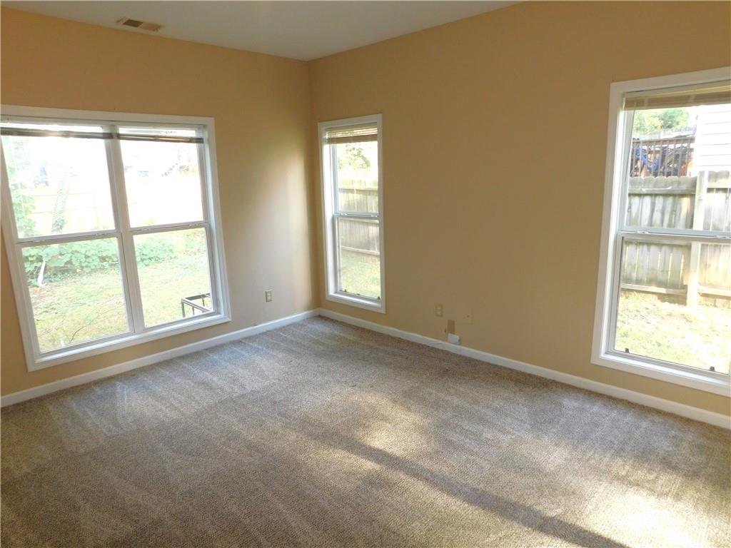 1005 Linam Avenue Southeast Atlanta, GA 30315 - Photo 18 of 29 an empty room with windows