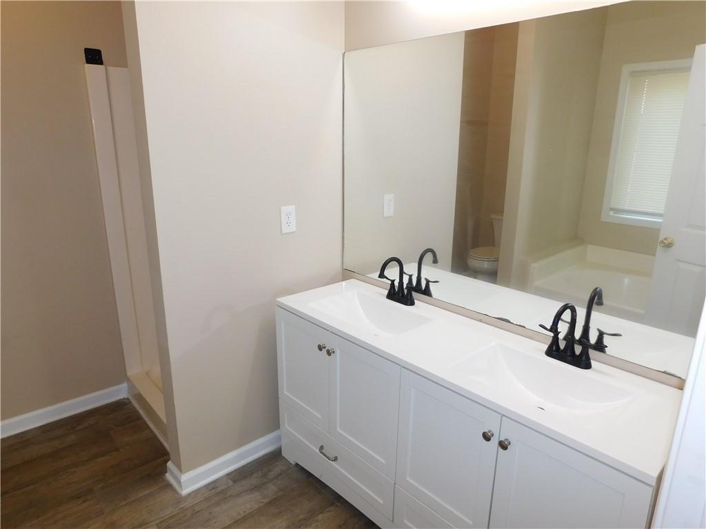1005 Linam Avenue Southeast Atlanta, GA 30315 - Photo 19 of 29 a bathroom with a sink and a mirror