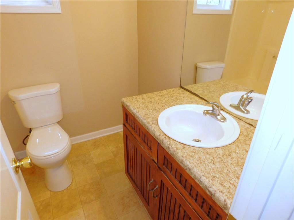 1005 Linam Avenue Southeast Atlanta, GA 30315 - Photo 25 of 29 a bathroom with a sink and a toilet