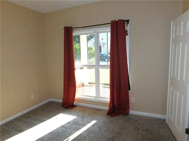 a view of a room with a large window