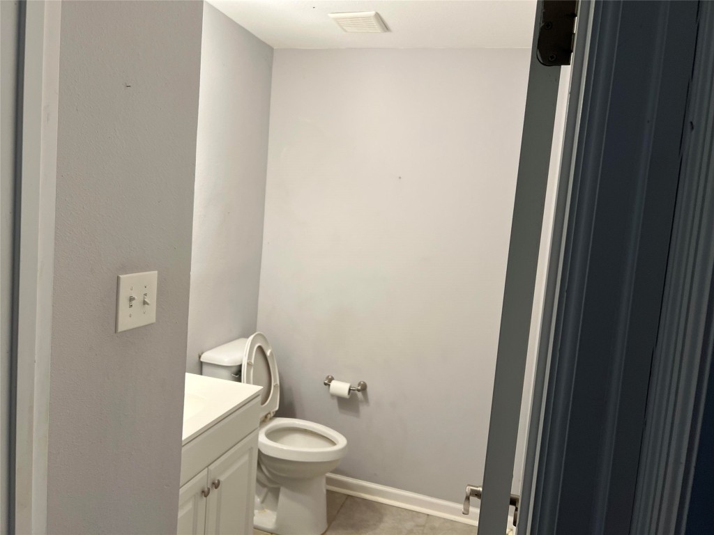 239 Old Firetower Road Bastrop, TX 78602 - Photo 10 of 39 a bathroom with a sink and a toilet