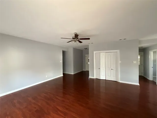 a view of balcony with wooden floor