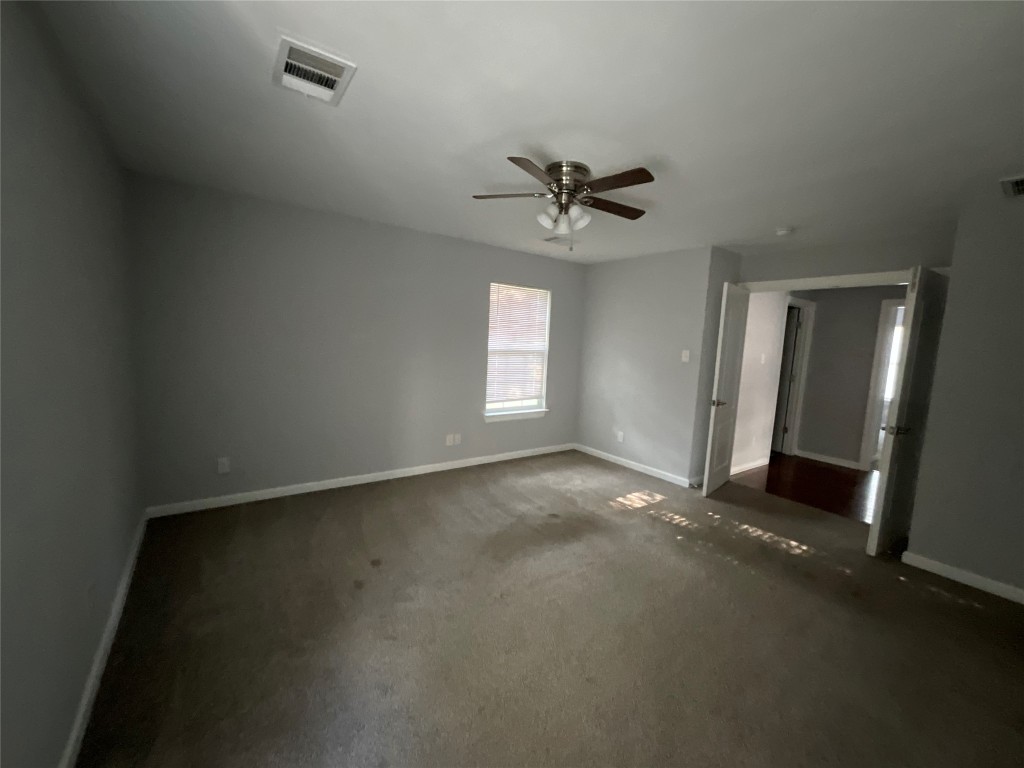 239 Old Firetower Road Bastrop, TX 78602 - Photo 37 of 39 a view of an empty room with a window