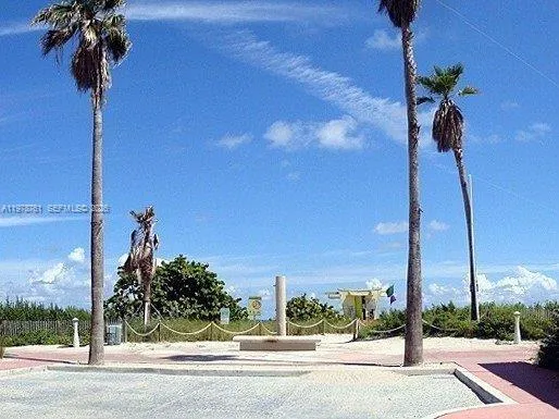 a view of a street with sitting area