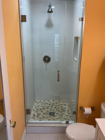a bathroom with a sink and toilet