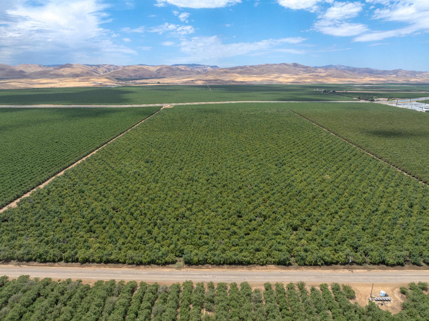 18401 Davis Road Patterson, CA 95363 - Photo 20 of 20 a view of a green field with clear sky