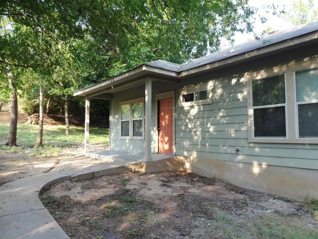 4704 Ledesma Road, Unit A & B Austin, TX 78721 - Photo 14 of 24 a view of a house with a yard