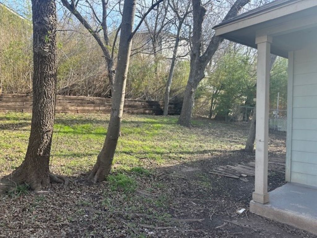 4704 Ledesma Road, Unit A & B Austin, TX 78721 - Photo 24 of 24 a backyard of a house with lots of green space