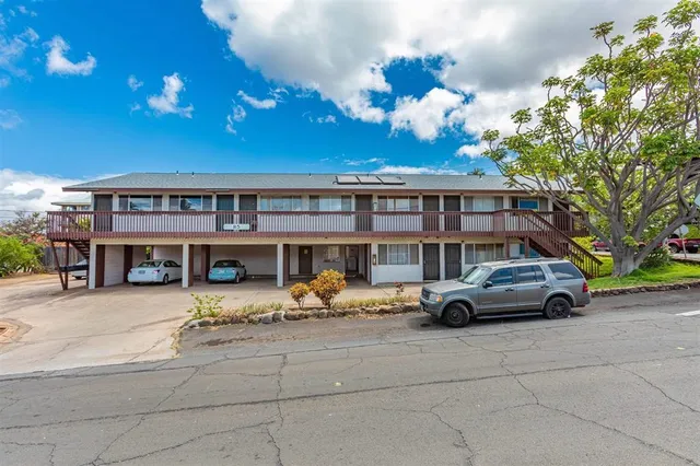 a car parked in front of a building