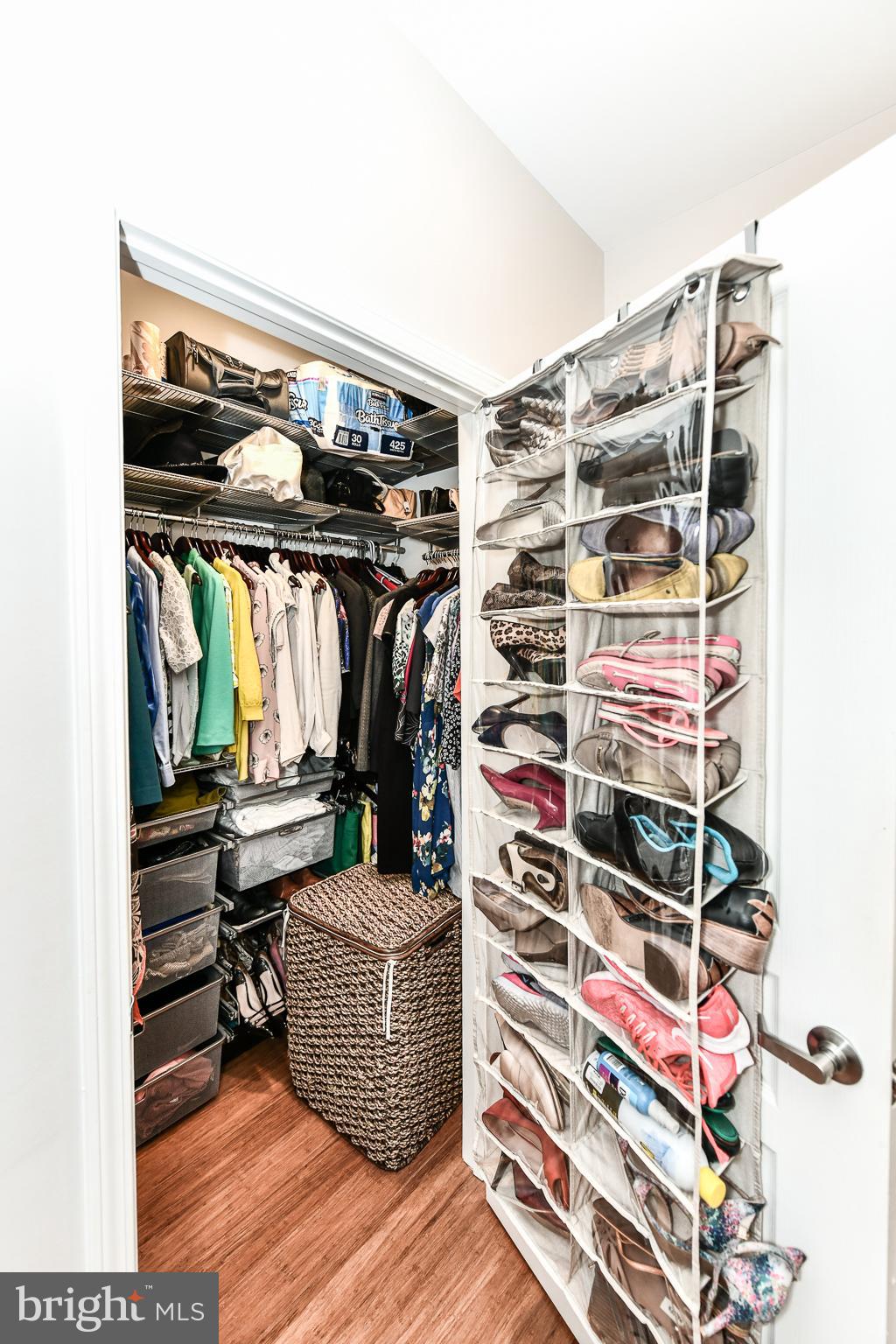 12000 Market Street, Unit 166 Reston, VA 20190 - Photo 16 of 33 Walk-in closet with Custom Elfa shelving!