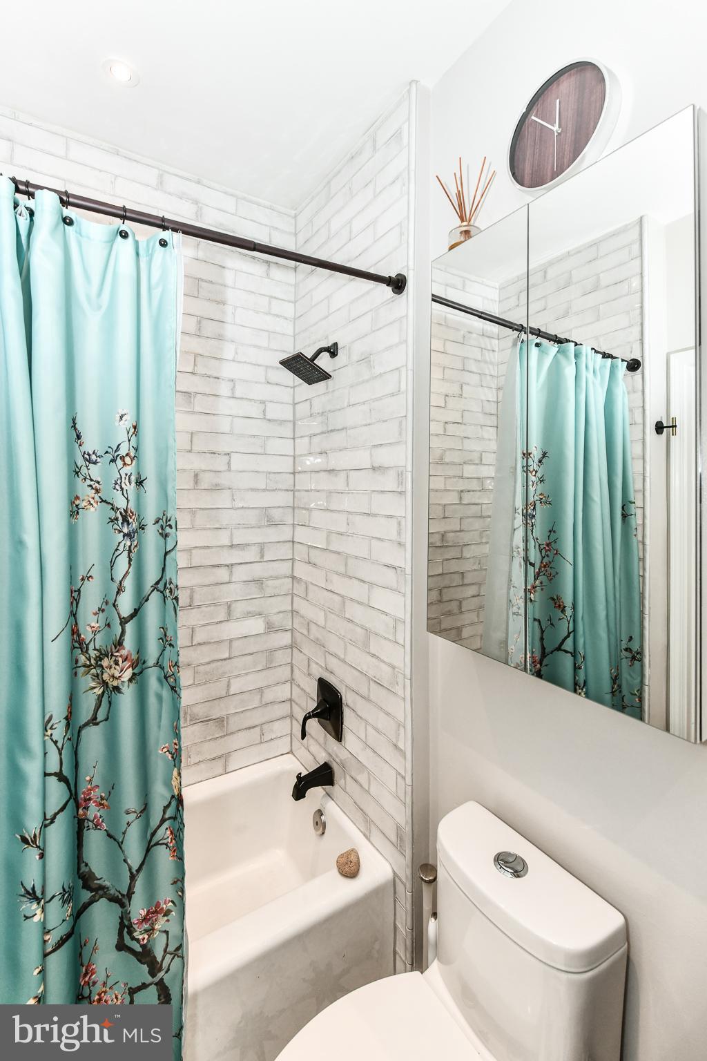 12000 Market Street, Unit 166 Reston, VA 20190 - Photo 18 of 33 New shower and floor tiles!