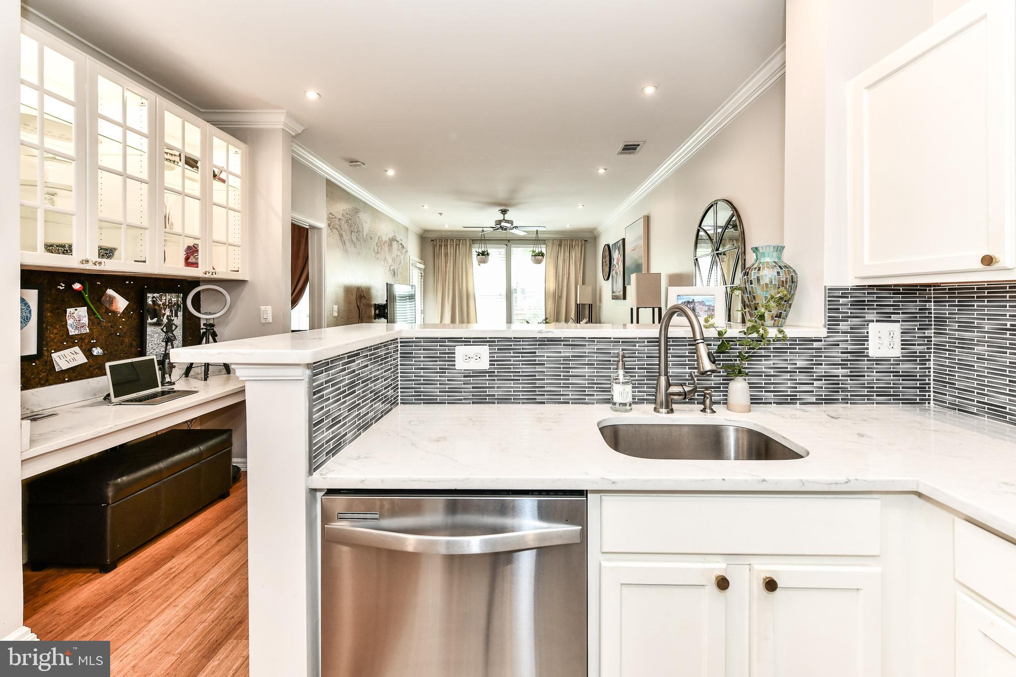 12000 Market Street, Unit 166 Reston, VA 20190 - Photo 5 of 33 Quartz countertops and updated backsplash!