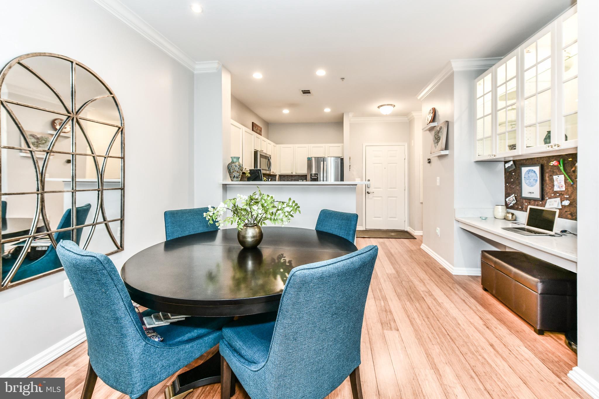 12000 Market Street, Unit 166 Reston, VA 20190 - Photo 9 of 33 Dining just off the open kitchen area!