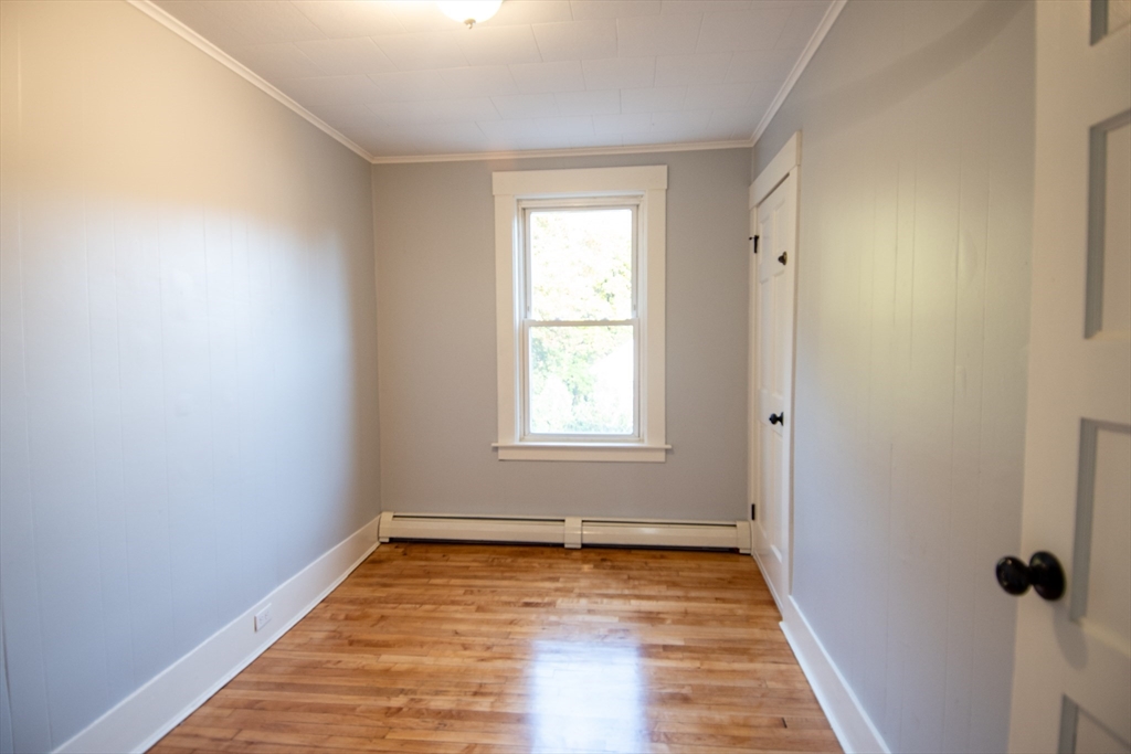 3 Bridge Street, Unit 2 Montague, MA 01349 - Photo 3 of 11 a view of a room with wooden floor and window