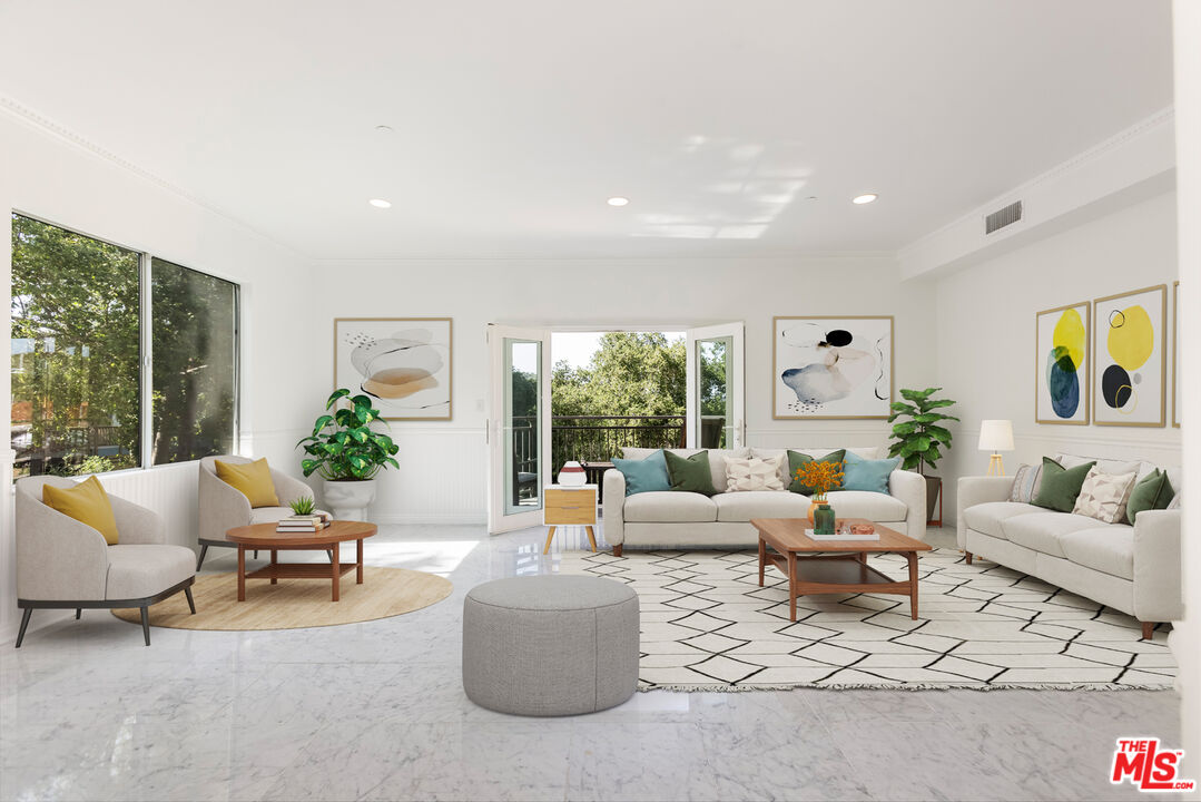 23636 Aster Trail Calabasas, CA 91302 - Photo 31 of 67 a living room with furniture and a large window