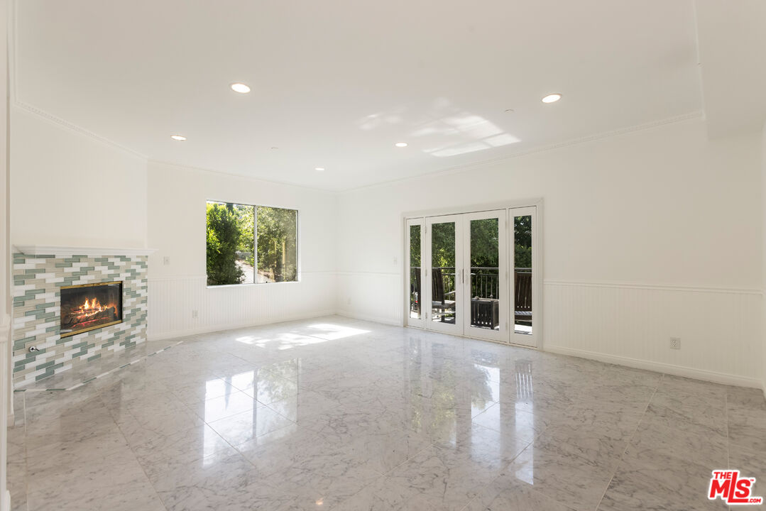 23636 Aster Trail Calabasas, CA 91302 - Photo 34 of 67 a view of a livingroom with a fireplace