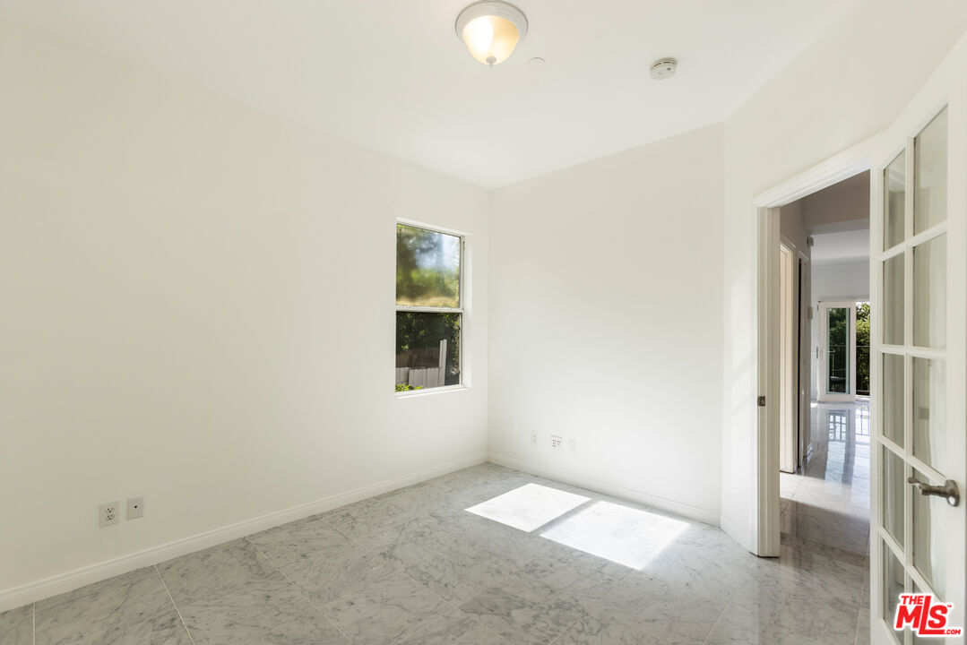 23636 Aster Trail Calabasas, CA 91302 - Photo 39 of 67 an empty room with a window