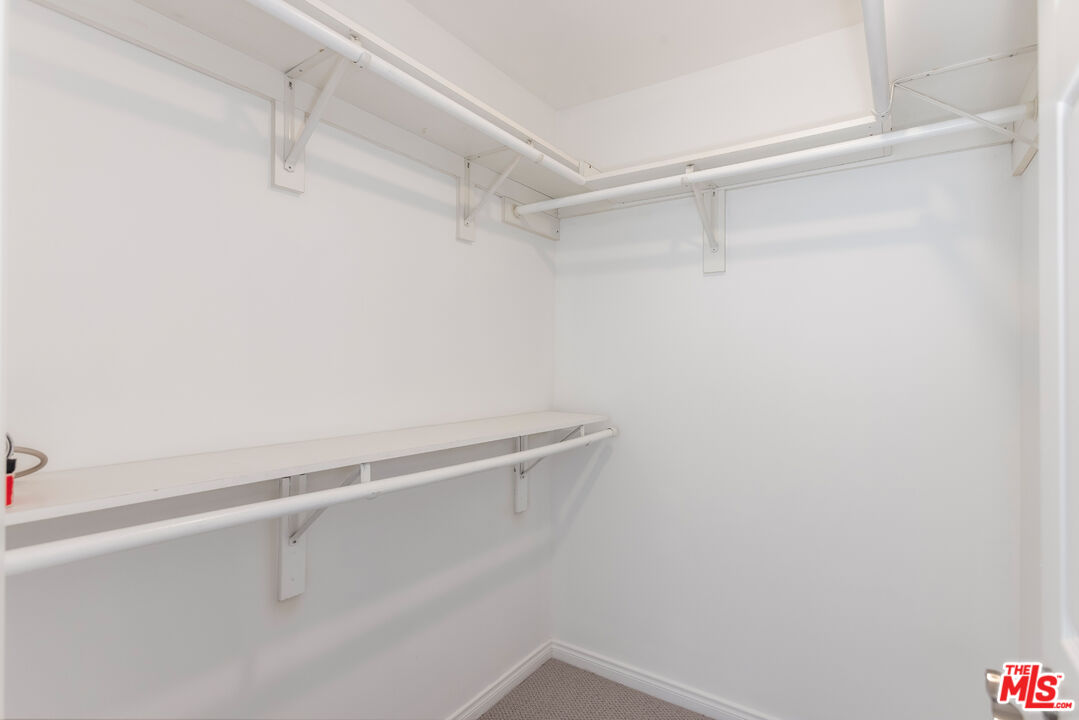 23636 Aster Trail Calabasas, CA 91302 - Photo 53 of 67 a view of a room with racks on the wall